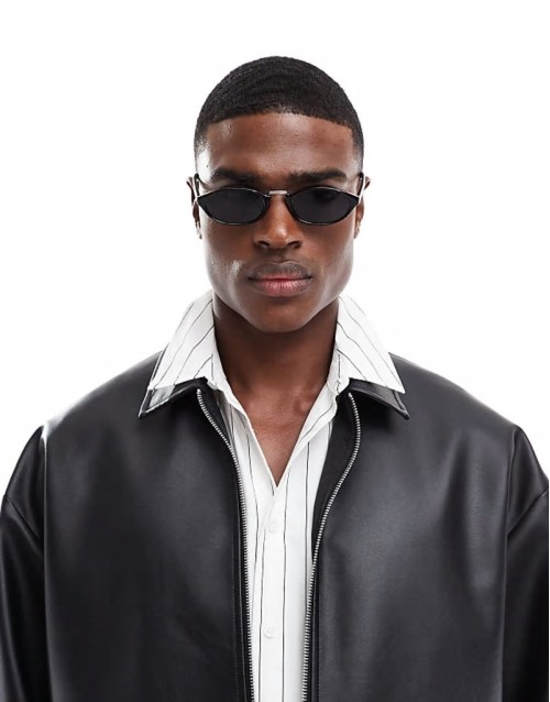 oval sunglasses in black with black lens