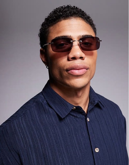 rimless sunglasses with burgundy rectangle lenses and metal gold frame